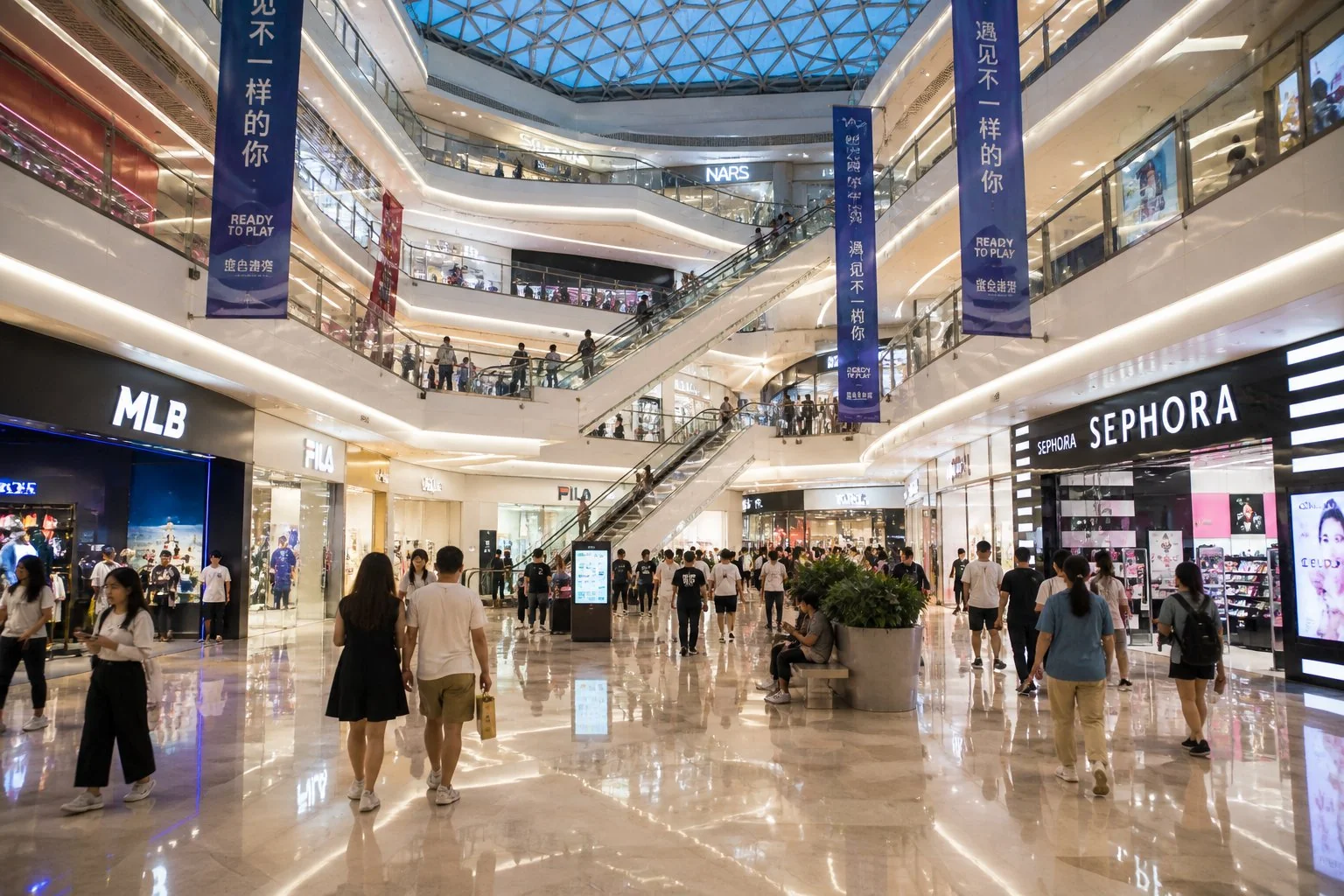 Beijing shopping mall with Chinese signage and crowds